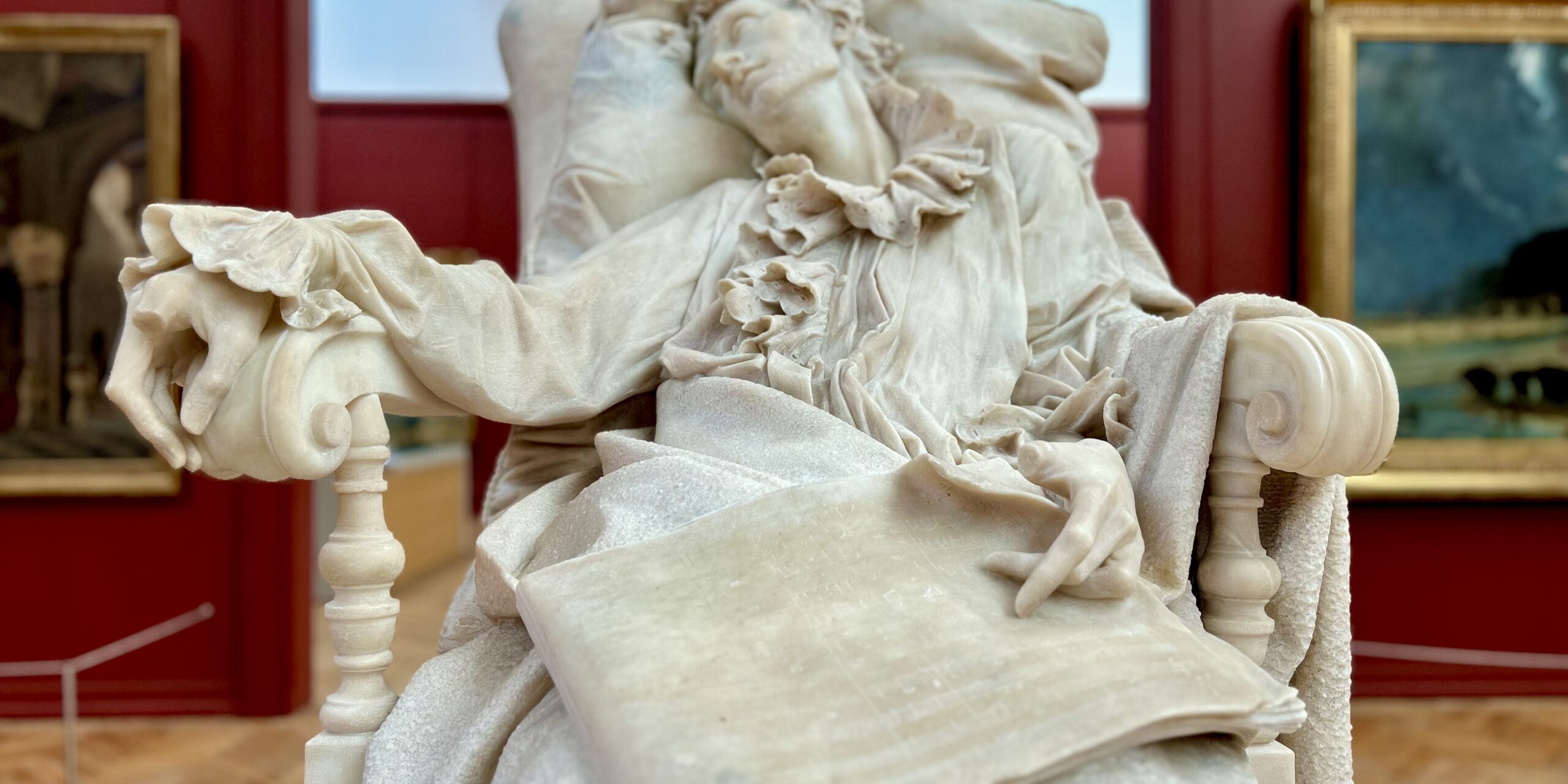 Mozart expirant – Rinaldo Carnielo Sculpture en marbre Mozart expirant de Rinaldo Carnielo au musée des Beaux-Arts de Bordeaux
