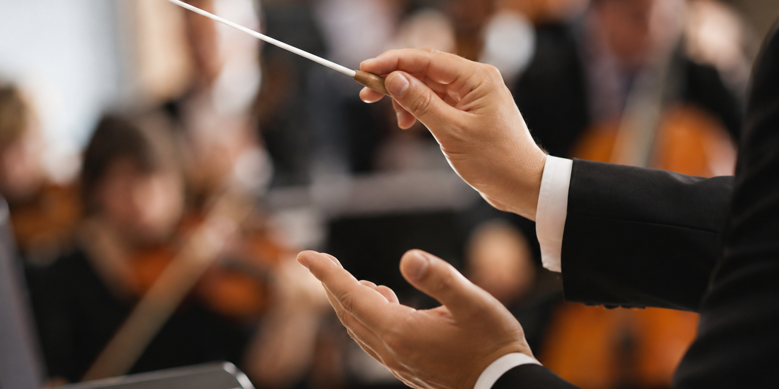 La baguette du chef d’orchestre Chef d’orchestre dirigeant des musiciens avec une baguette